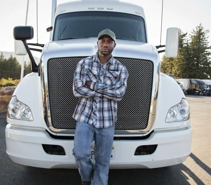 black-man-truck-driver-near-his-truck-parked-in-a-2023-11-27-05-32-49-utc_3_11zon