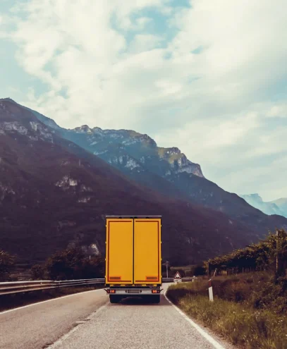 truck-on-the-road-yellow-cargo-car-2023-11-27-04-59-18-utc_9_11zon