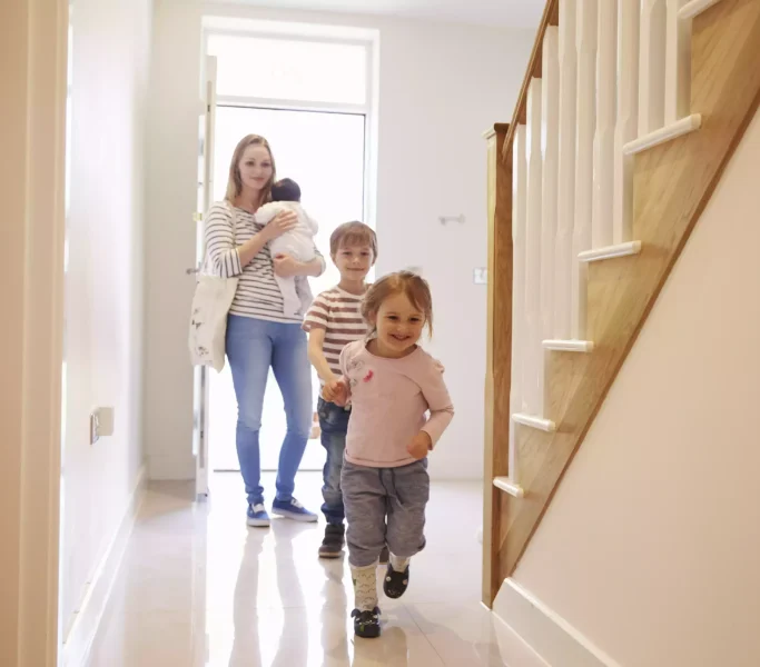 young-family-looking-around-property-for-sale-2024-10-21-00-10-50-utc-min